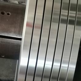 COPOLYMER COATED STAINLESS STEEL TAPE